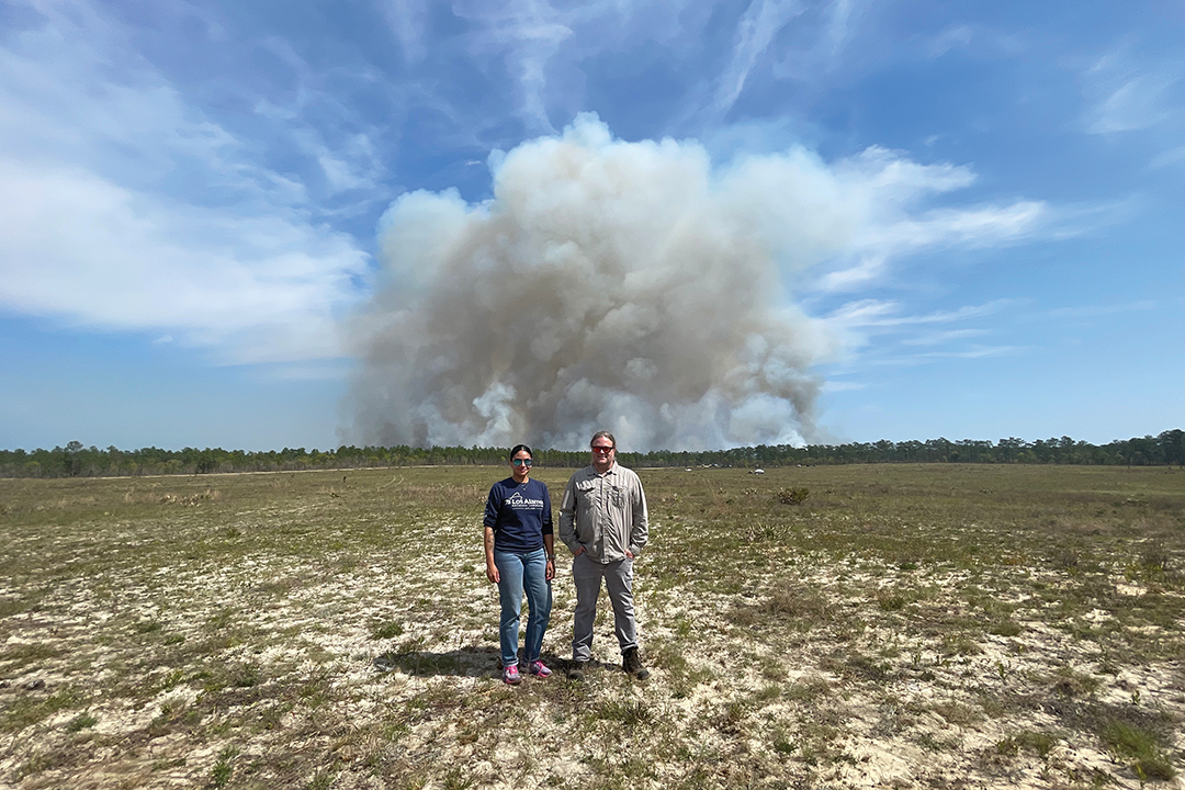 Dorianis Perez and Jesse Canfield represent Los Alamos National Laboratory at the Eglin Prescribed Fire Campaign, Eglin Air Force Base, Florida. Courtesy photo.